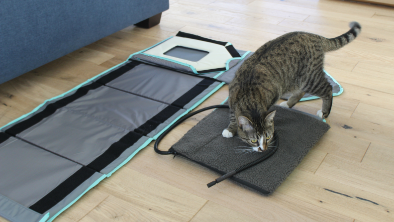 The Frisco Heated Cat House unassembled, displaying the velcro strips that line the walls