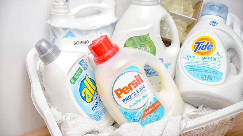 A laundry basket filled with detergents for sensitive skin