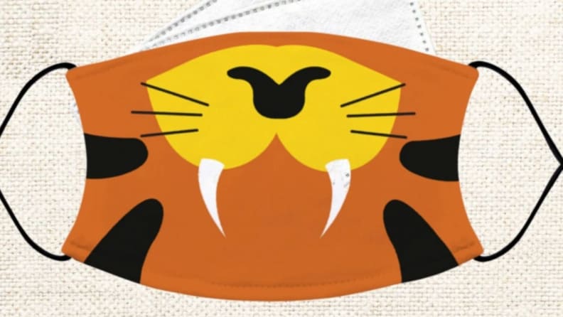 A tiger mask with very sharp-looking teeth.