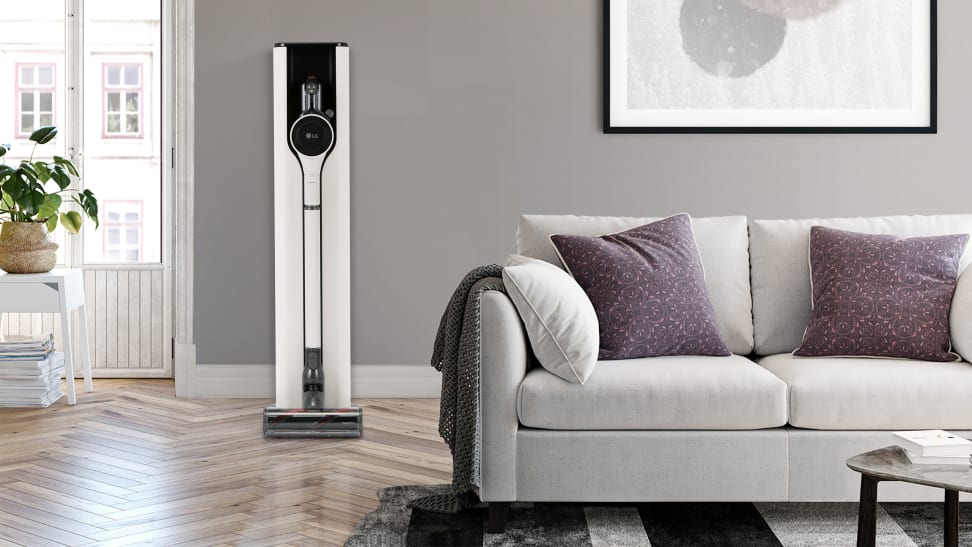 The LG CordZero A939KBGS cordless vacuum stands in its base in a living room