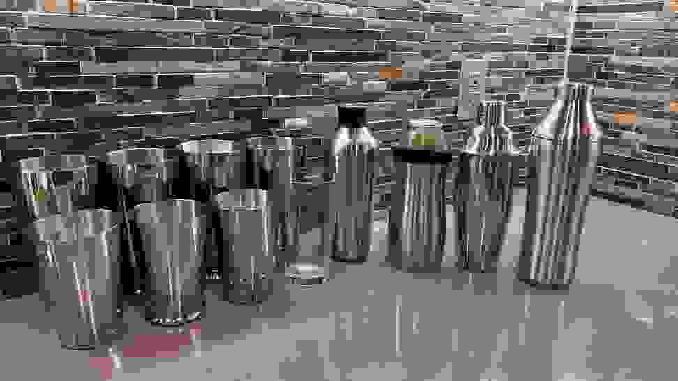 A large selection of cocktail shakers waiting to be tested