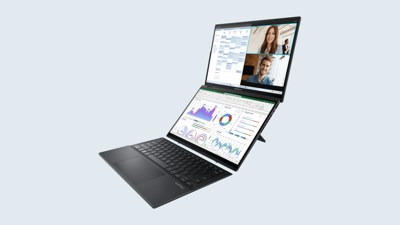 A Zenbook Duo in black with both screens fully opened, showing a video call on one and a slideshow with graphs on the other.