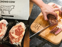 On left, two pieces of raw packaged steak with Crowd Cow packaging in background. On right, a hand cutting a piece of cooked steak on a Crowd Cow cutting board.