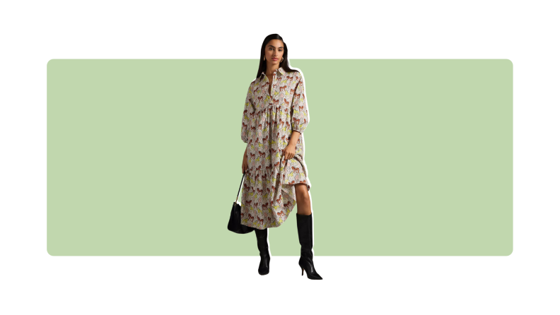 A midi-length shirt dress with puff sleeves and made from animal print.