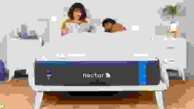 Two people reclining on Nectar mattress.