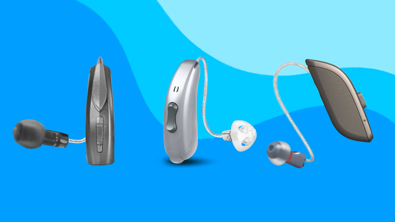 Assorted hearing aids in front of blue background.