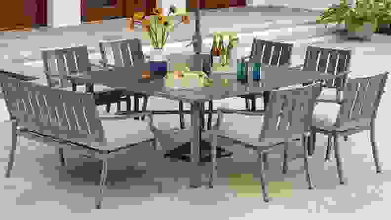Tan patio furniture set outdoors.