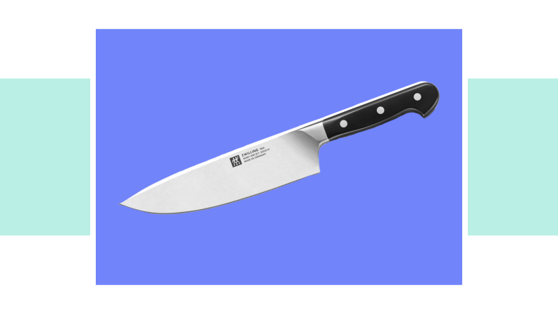 An image of a Zwilling Pro 8-inch chef's knife with a black handle.