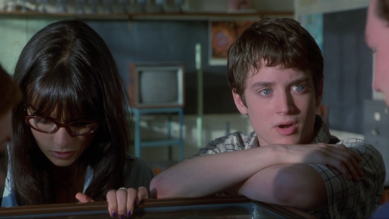 Elijah Wood and Jordana Brewster battle aliens in ‘The Faculty.’