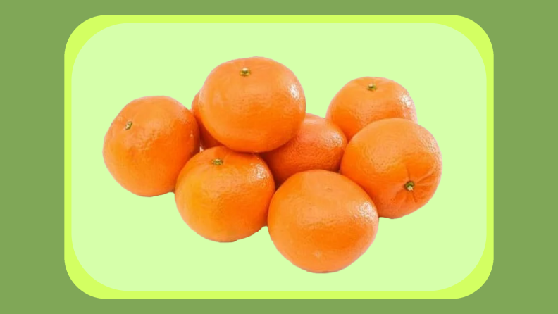 Seven orange clementines gathered together.