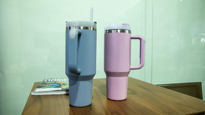 A tumbler purchased from Temu next to a Stanely Cup.