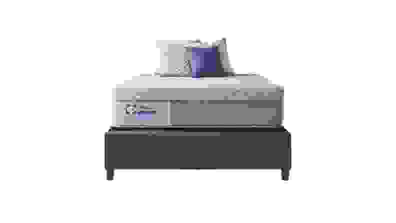 A Sealy Posturepedic 13-Inch Hybrid Lacey Plush Mattress in front of a white background.