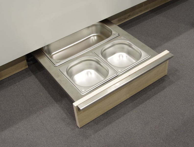 Pet food tray built into cabinetry