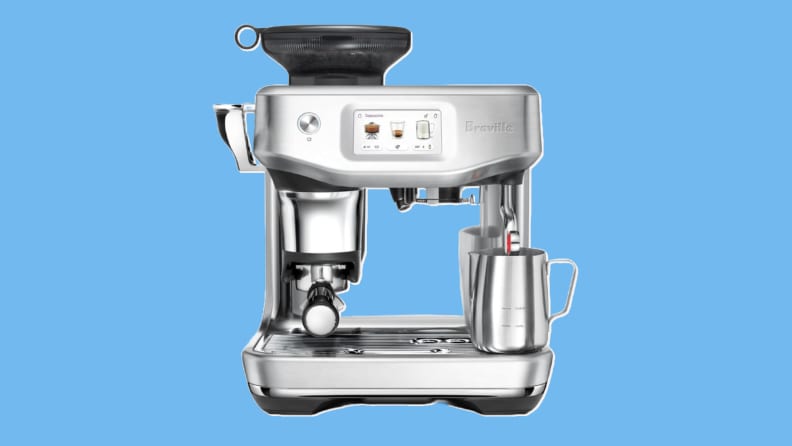 A Breville Barista Touch Impress espresso machine on a blue background