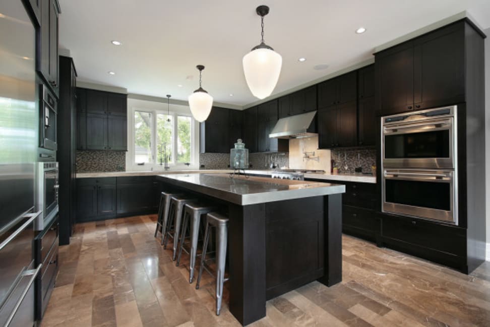 Lights hang over a kitchen island