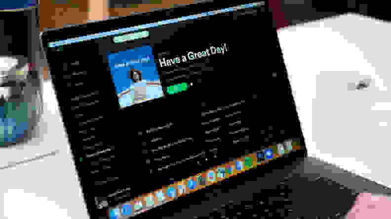 A computer playing Spotify