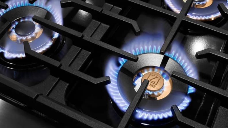 A closeup of the dual-ring burners on the zline 36-inch DuoPro cooktop