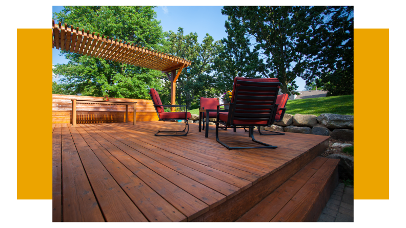 A stained backyard deck in a sunny day.