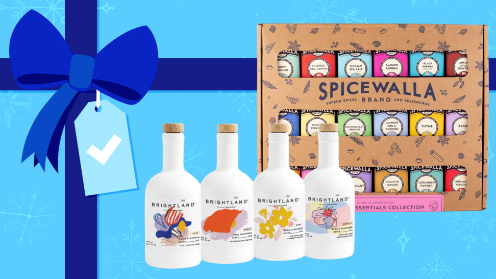 White bottles and a spice box on a blue gift background