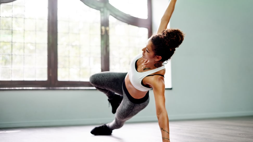 A woman in a side plank.