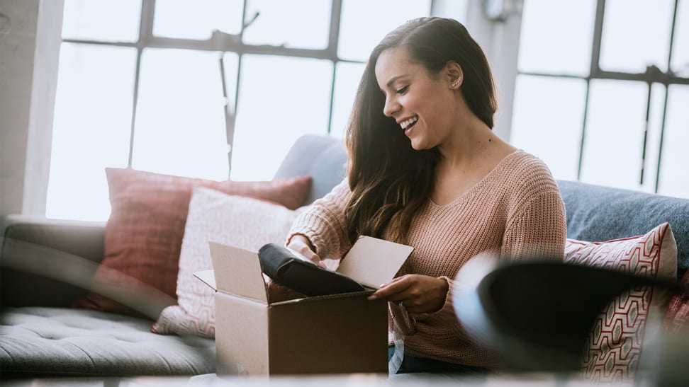 Woman opens a package