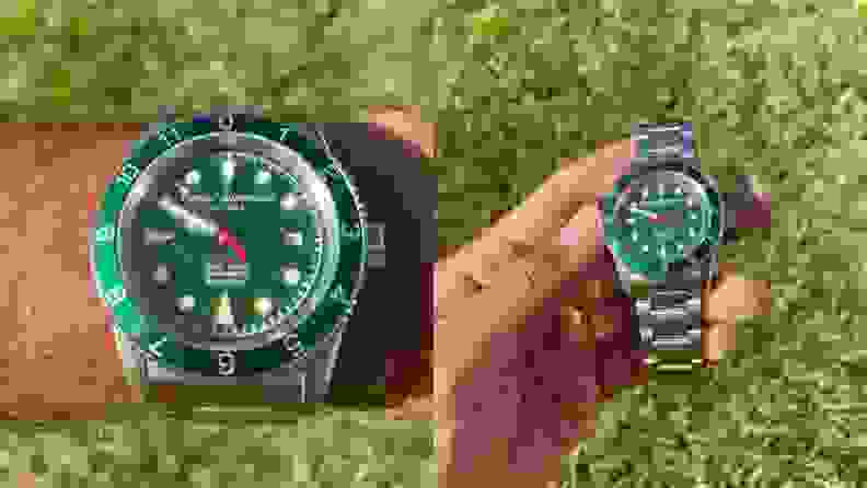 Green Stewart Dawson Voyager watch on wrist, hand holding Stewart Dawson Voyager watch