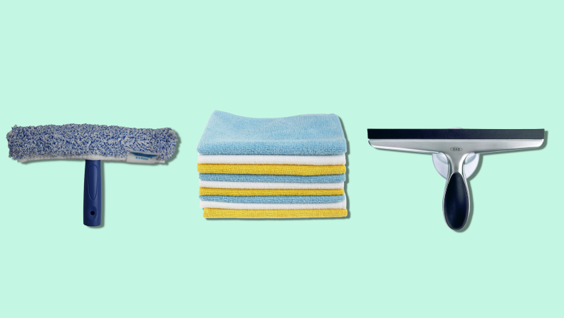 A scrubber brush, squeegee, and pack of microfiber cloths on a mint green background.