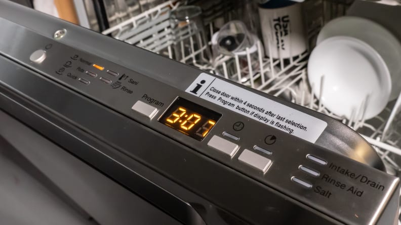 Close-up of the dishwasher's controls, which are located on the right half of its top edge.