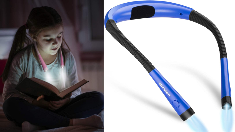 A child reads in the dark with a wearable reading lamp.