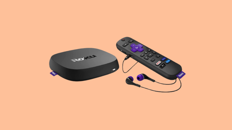 Roku box and remote against peach background