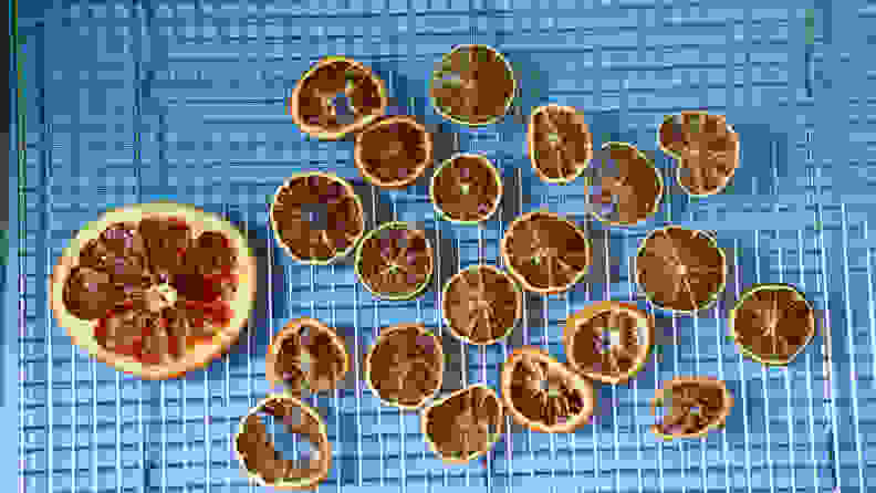 Dried citrus fruits on a drying rack