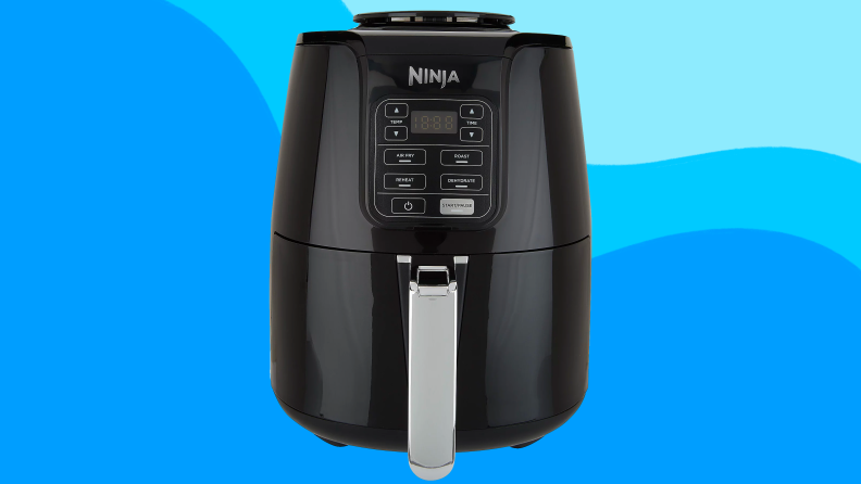 Ninja air fryer on a blue background