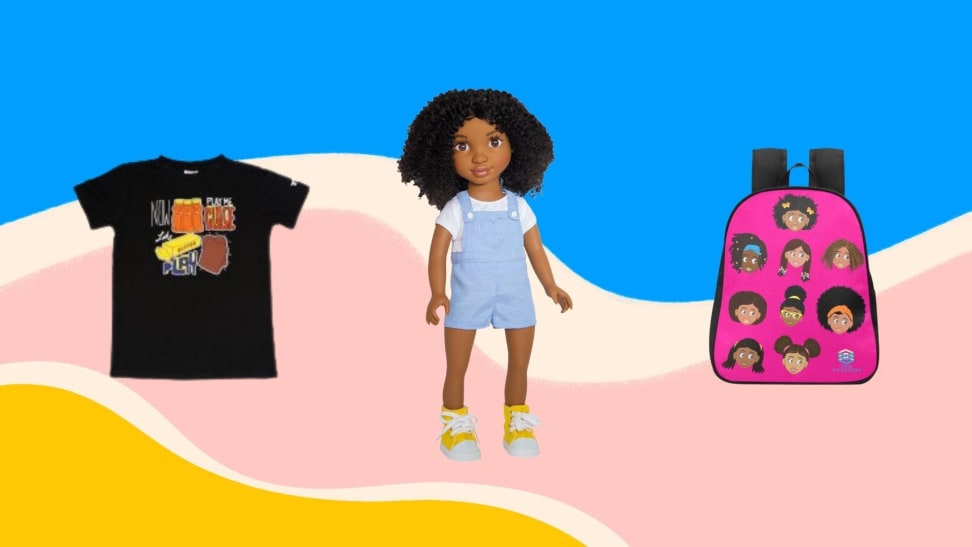 A black T-shirt, Black baby doll, and a pink backpack with illustrations of Black girls on it on a pink, yellow, and blue background.