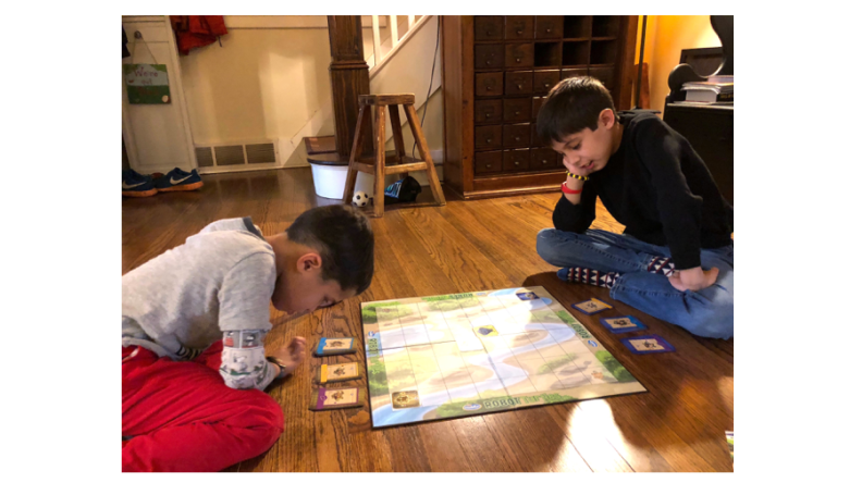 Younger and older kids can play Robot Turtles together.