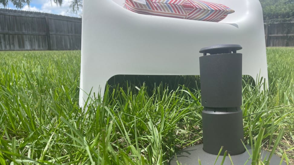 A repeller station for mosquitos installed in a yard