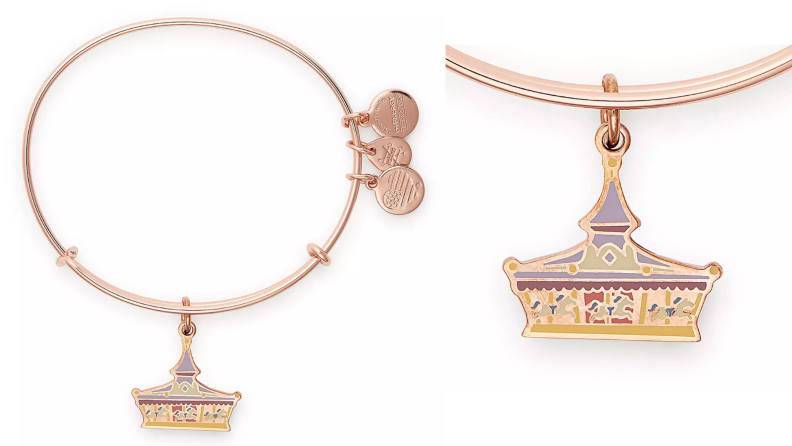 A rosegold bracelet featuring a King Arthur carosel charm