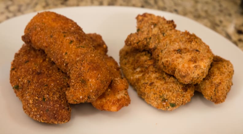 Deep fried on the left, airfried on the right. A batter is preferred for deep frying, but I used the same breadcrumb coating for consistency's sake. Obviously the deep fried tenders have better color.