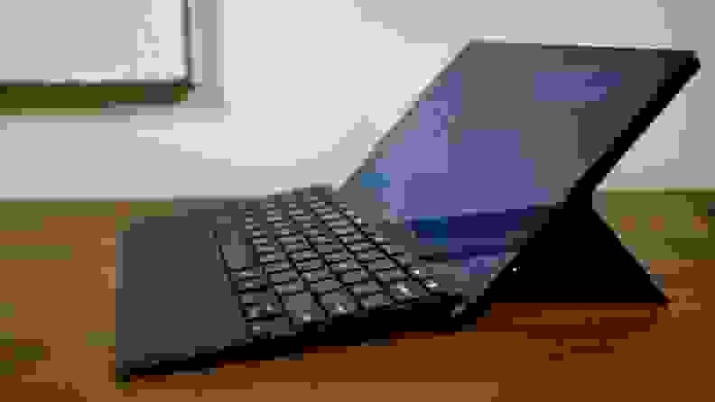 A side view of the CM3 with the keyboard attached and the kickstand extended.