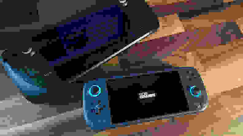 The steam deck and a much smaller handheld console with the intro screen to Control on it