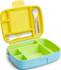A variety of brightly colored lunch boxes sit open and closed on a marble counter.