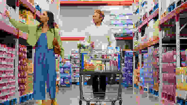 Customers shopping for groceries in Sam's Club store