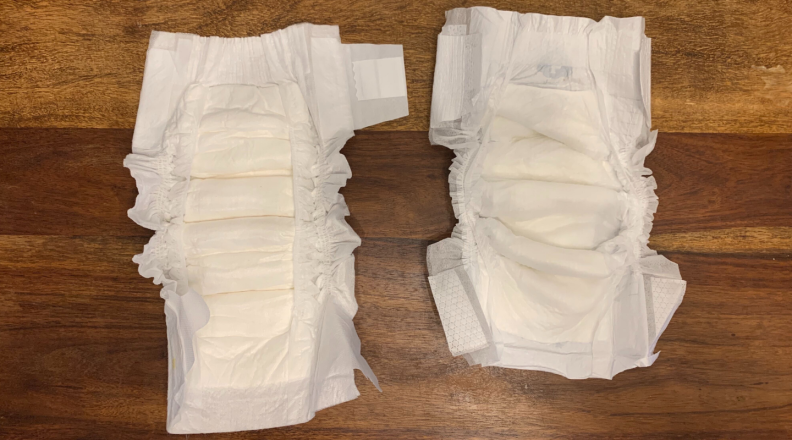 On the left is a picture of Dyper's size large diaper (20-31 pounds), and on the right is Target's Cloud Island Size 4 diaper (22-37 pounds).