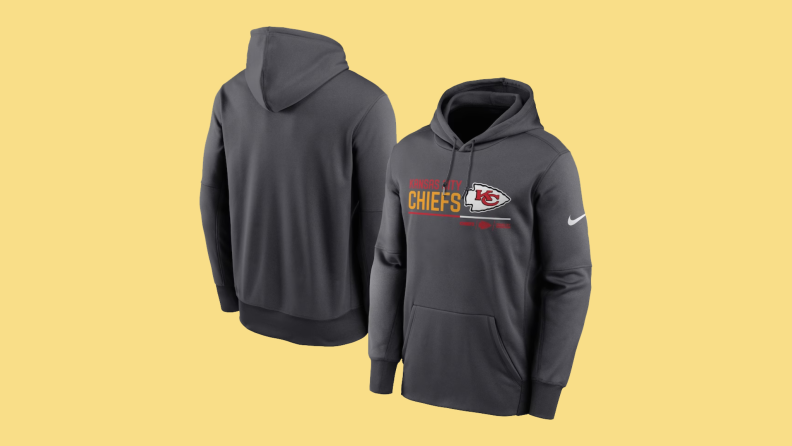 A Kansas City Chiefs hoodie on a yellow background.