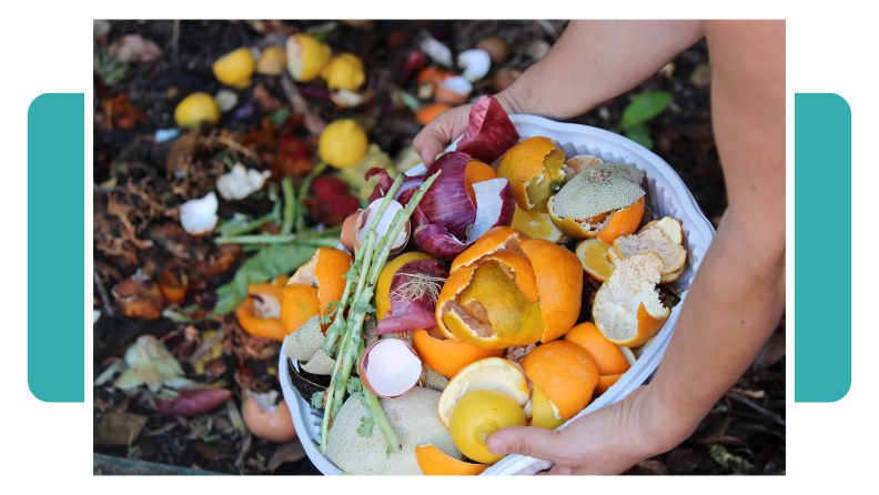 A person holding a bowl of orange peels, onion clippings, and egg shells and adding them to their compost.