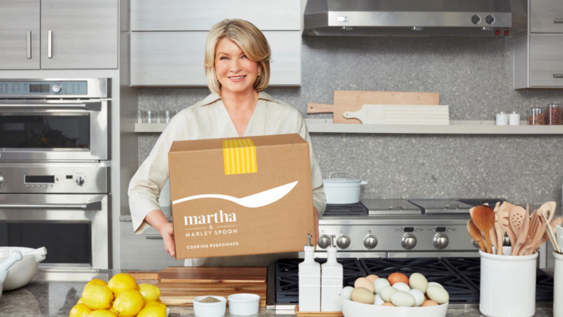 Martha Stewart holding Marley Spoon box