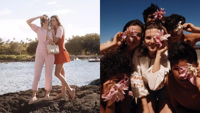 two women aiming a camera, a group of women holding flowers