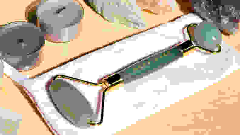 A photo of the Herbivore Jade Facial Roller.