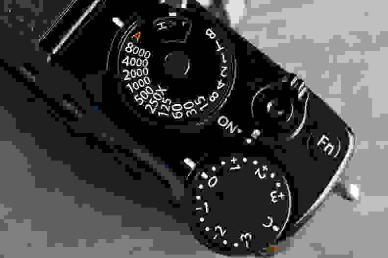 Pretty much all cameras have some kind of exposure compensation tool, either a button you press or a dial like on this camera.