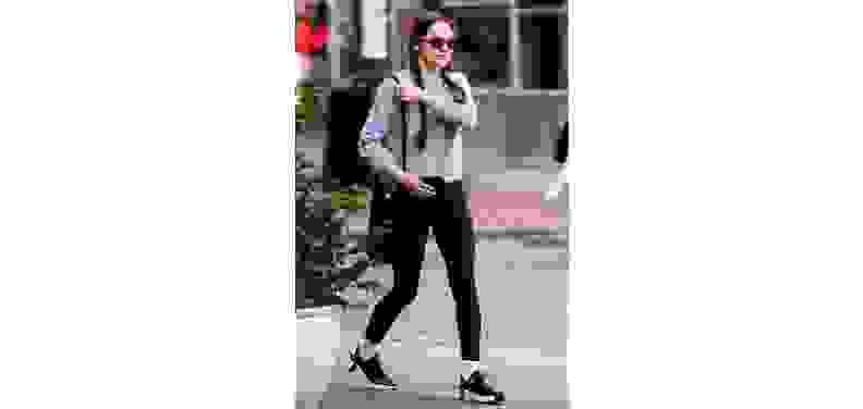 Olivia Rodrigo wearing the Nike Free Metcon while walking around town.
