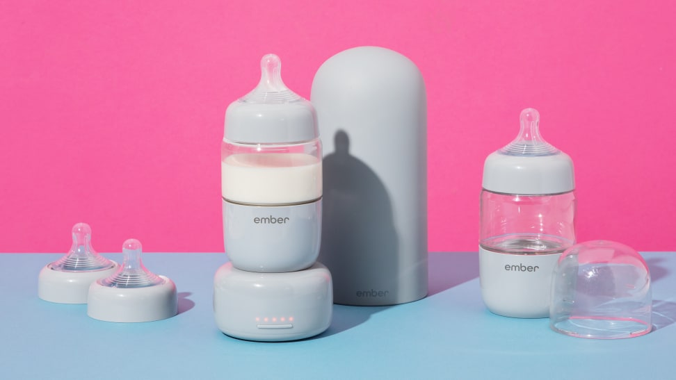 Ember Baby Bottle System on a pink and baby blue background.